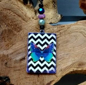 Butterfly charm black braided cord necklace